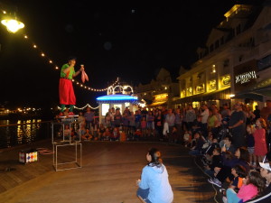 A street performer wows the audience with his juggling skills at Disney's Boardwalk resort.
